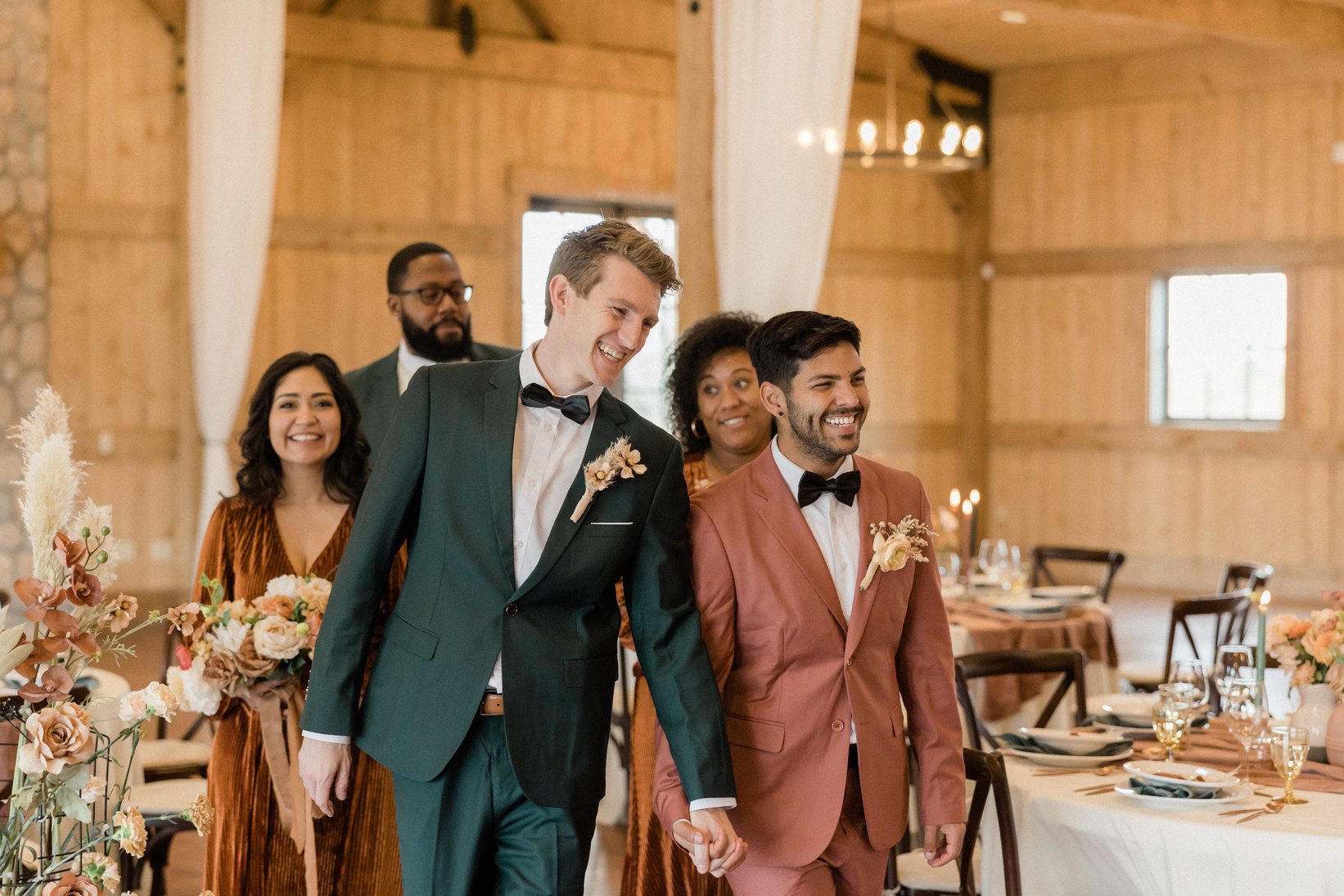 Newlywed Couple Walking in the Reception with Friends